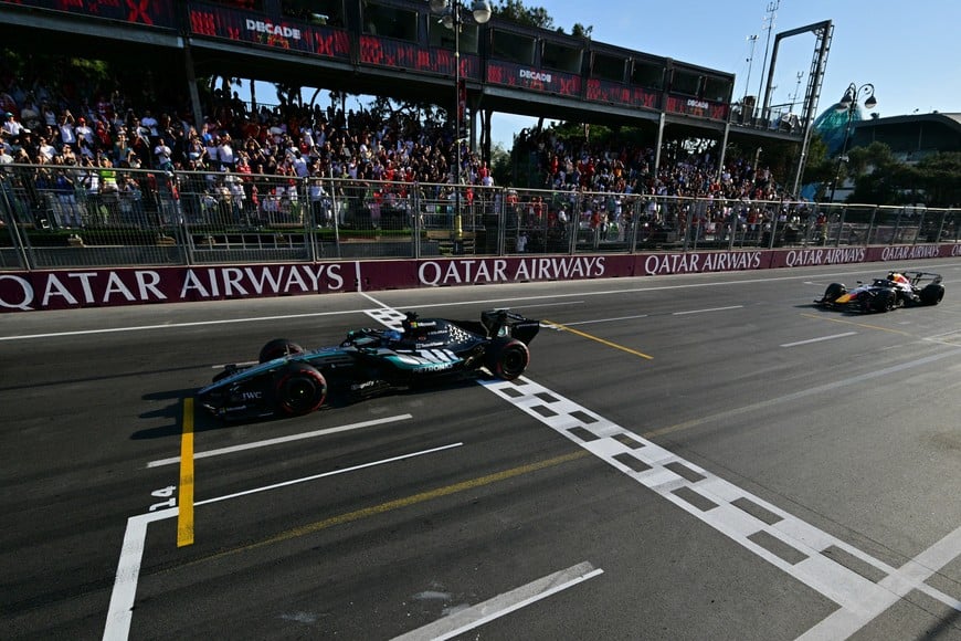 Formula One F1 - Azerbaijan Grand Prix - Baku City Circuit, Baku, Azerbaijan - September 26, 2026
Mercedes' George Russell crosses the line to win the race Pool via REUTERS/Andrej Isakovic