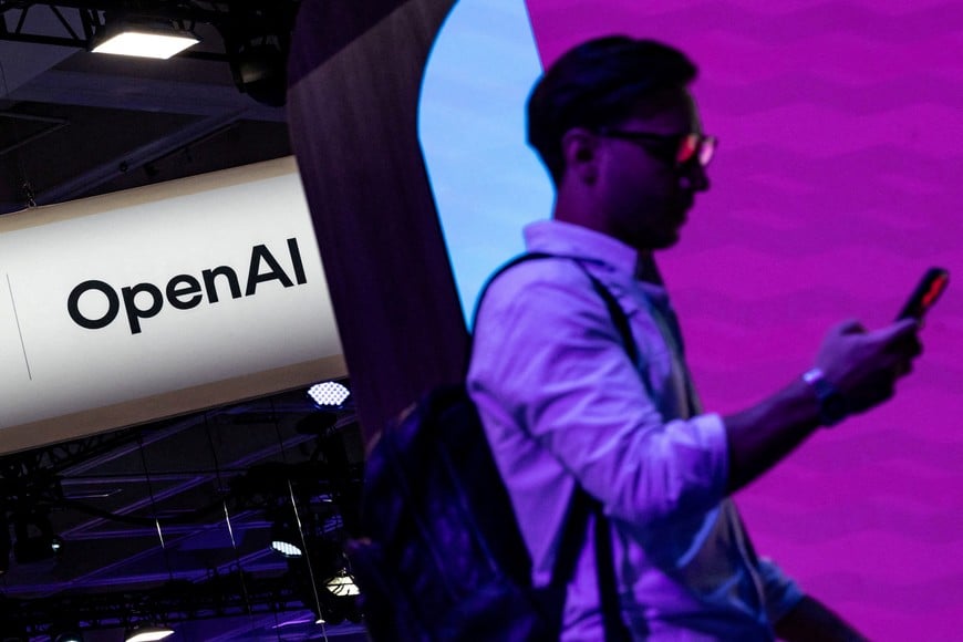 FILE PHOTO: A man walks past an OpenAI booth at Moscone Center during the Dreamforce 2026 technology summit in San Francisco, California, US, September 17, 2026. REUTERS/Carlos Barria/File Photo