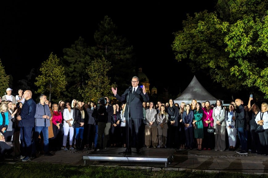 Serbian President Aleksandar Vucic addresses citizens outside the Presidency of Serbia moments before formally submitting his resignation, ending his second and final five-year term in office, in Belgrade, Serbia, September 27, 2026. REUTERS/Djordje Kojadinovic