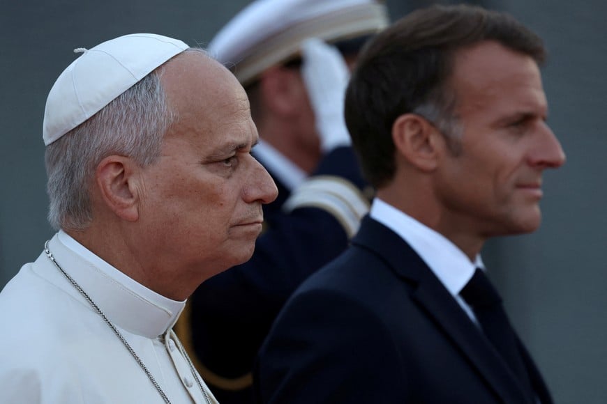 Pope Leo XIV and France's President Emmanuel Macron take part in a farewell ceremony, an official departure protocol marking the end of an apostolic journey, at Metz–Nancy–Lorraine Airport in Goin, northeastern France, September 28, 2026. Romeo Boetzle/Pool via REUTERS