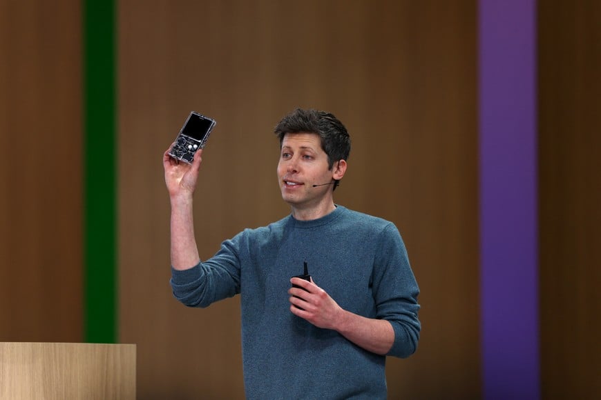 OpenAI CEO Sam Altman holds a device during OpenAI's annual DevDay event in San Francisco, California, US, September 29, 2026. REUTERS/Carlos Barria