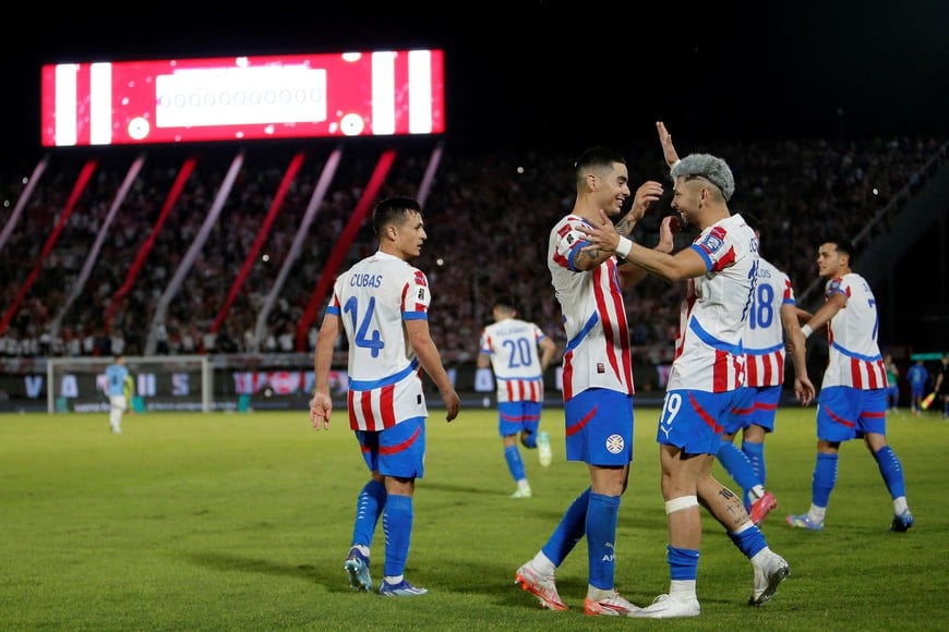 Soccer Football - World Cup - South American Qualifiers - Paraguay v Uruguay - Estadio Defensores del Chaco, Asuncion, Paraguay - June 5, 2025
Paraguay's Julio Enciso celebrates scoring their second goal with Miguel Almiron REUTERS/Cesar Olmedo