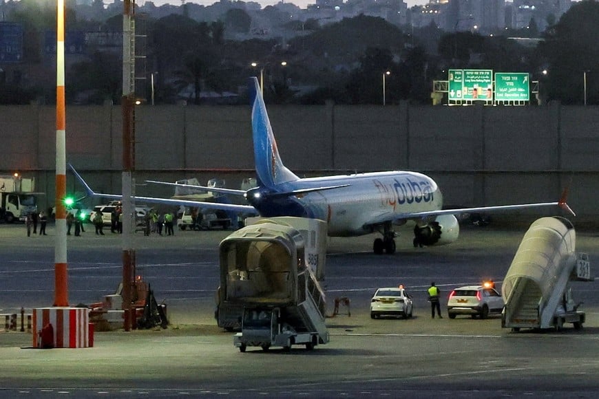 A plane, carrying passengers who were on the FlyDubai aircraft bound for Israel from the United Arab Emirates, which was diverted to Saudi Arabia following an emergency signal, on the tarmac as it arrives at the Ben Gurion International Airport, in Lod, near Tel Aviv, Israel, September 30, 2026. REUTERS/Ammar Awad TPX IMAGES OF THE DAY