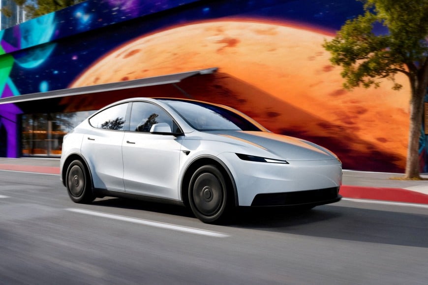 FILE PHOTO: Tesla Motors' Model Y Standard car is seen in this handout picture released by Tesla Motors on October 7, 2025. Tesla Motors/Handout via REUTERS THIS IMAGE HAS BEEN SUPPLIED BY A THIRD PARTY. NO RESALES. NO ARCHIVES. MANDATORY CREDIT/File Photo