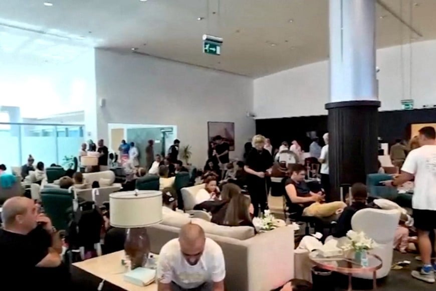 Passengers at Tabuk airport after a Flydubai aircraft that was bound for Israel from the United Arab Emirates was diverted to Saudi Arabia after transmitting emergency signals, in Tabuk, Saudi Arabia, in this screen grab obtained from a video dated September 30, 2026. Video Obtained by Reuters via REUTERS THIS IMAGE HAS BEEN SUPPLIED BY A THIRD PARTY.