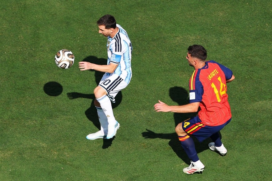 Soccer Football - FIFA World Cup 2026 - Final - Spain v Argentina - New York/New Jersey Stadium, East Rutherford, New Jersey, U.S. - July 19, 2026
Argentina's Lionel Messi in action with Spain's Aymeric Laporte REUTERS/Carlos Barria