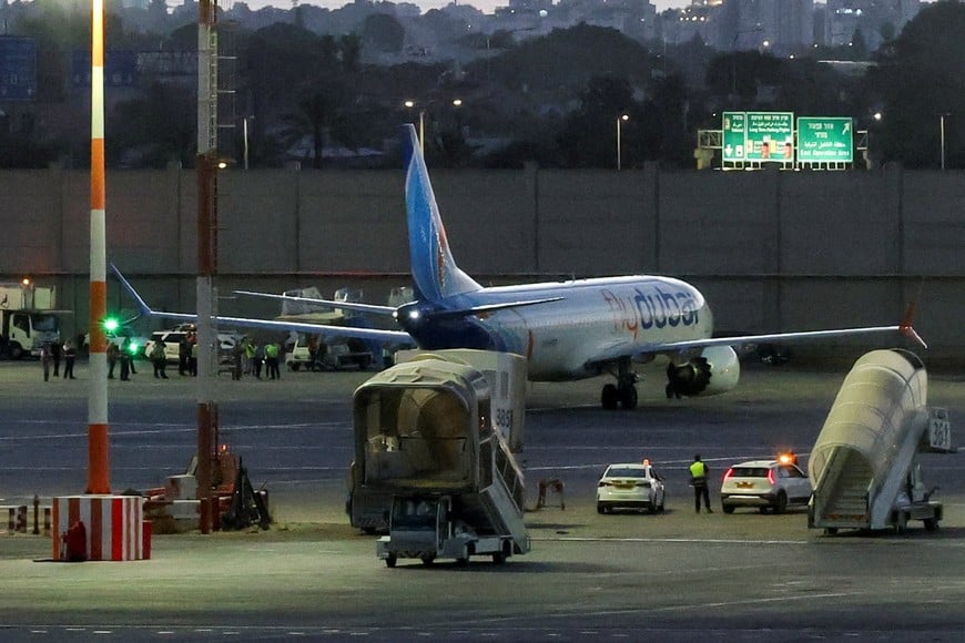 A plane, carrying passengers who were on the FlyDubai aircraft bound for Israel from the United Arab Emirates, which was diverted to Saudi Arabia following an emergency signal, on the tarmac as it arrives at the Ben Gurion International Airport, in Lod, near Tel Aviv, Israel, September 30, 2026. REUTERS/Ammar Awad