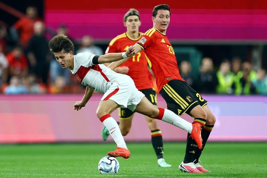Soccer Football - Nations League - Group A1 - Belgium v Turkey - Stade Maurice Dufrasne, Liege, Belgium - October 2, 2026
Turkey's Arda Guler in action with Belgium's Hans Vanaken REUTERS/Yves Herman TPX IMAGES OF THE DAY