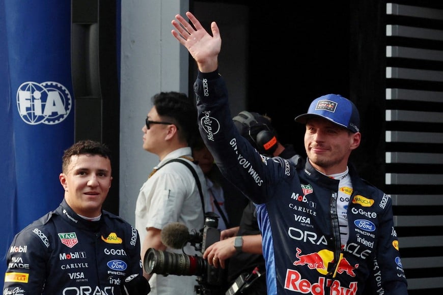 Formula One F1 - Bahrain Grand Prix - Sepang International Circuit, Sepang, Malaysia - October 3, 2026
Red Bull's Max Verstappen celebrates after qualifying in pole position with third placed Red Bull's Isack Hadjar REUTERS/Annice Lyn/Pool TPX IMAGES OF THE DAY
