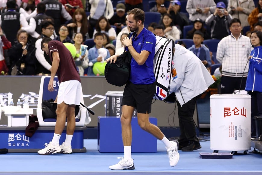 Tennis - China Open - National Tennis Center, Beijing, China - October 5, 2026
Russia's Daniil Medvedev walks off the court after being disqualified from his semi final match against Serbia's Novak Djokovic for hitting a ball into the crowd injuring a spectator REUTERS/Tingshu Wang