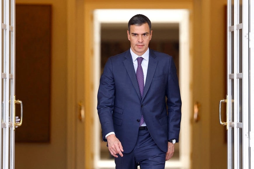 FILE PHOTO: Spain's Prime Minister Pedro Sanchez walks to greet European Council President Charles Michel at Moncloa Palace in Madrid, Spain, May 30, 2024. REUTERS/Susana Vera/File Photo