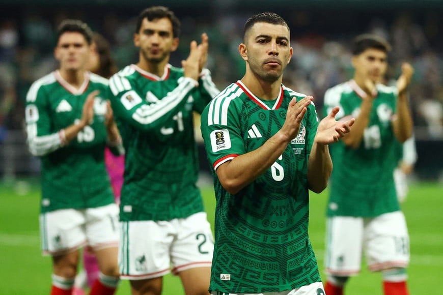 Soccer Football - FIFA World Cup 2026 - Round of 16 - Mexico v England - Estadio Azteca, Mexico City, Mexico - July 5, 2026
Mexico's Erik Lira and teammates applaud fans after the match as Mexico are eliminated from the World Cup REUTERS/Daniel Becerril