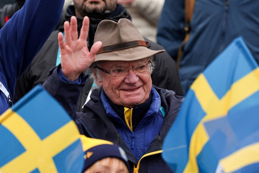 Milano Cortina 2026 Olympics - Cross-Country Skiing - Women's Sprint Classic Victory Ceremony - Tesero Cross-Country Skiing Stadium, Lago, Italy - February 10, 2026.
Sweden's King Carl XVI Gustav gestures before the victory ceremony. REUTERS/Kacper Pempel TPX IMAGES OF THE DAY