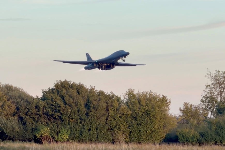 A B-1 bomber takes off from RAF Fairford airbase, as the US removes its B-1 bombers one week after several men were arrested on suspicion of offences under the Explosives Act, in this screengrab obtained from a social media video in Fairford, Gloucestershire, Britain October 4, 2026. @CraigYoungMedia via X/via REUTERS THIS IMAGE HAS BEEN SUPPLIED BY A THIRD PARTY. MANDATORY CREDIT. NO RESALES. NO ARCHIVES.
Verification notes: Reuters verified the location and date when the video was recorded from the original file metadata. The trees, utility tower and terrain seen in the video matched archive and satellite imagery of the area. The model of the aircraft was verified from the design of the plane, the engines, the nose and the wings seen in the video, which matched archive imagery of the Rockwell B-1B Lancer.