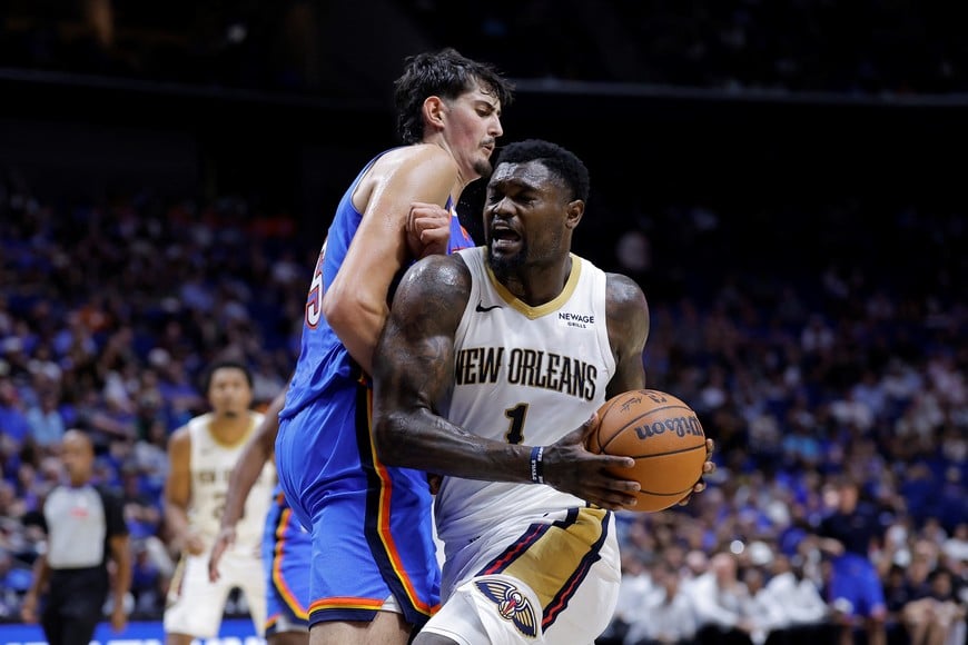 Oct 6, 2026; Tulsa, Oklahoma, USA; New Orleans Pelicans forward Zion Williamson (1) drives to the basket as Oklahoma City Thunder center Aday Mara (15) defends during the first half at BOK Center. Mandatory Credit: Alonzo Adams-Imagn Images