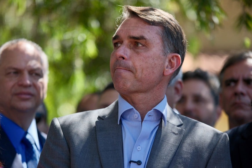 Brazilian presidential candidate Flavio Bolsonaro of the Liberal Party (PL) reacts as he speaks to the media, on the day of a meeting with representatives of political parties supporting his campaign ahead of the runoff election, in Brasilia, Brazil, October 7, 2026. REUTERS/Diego Herculano
