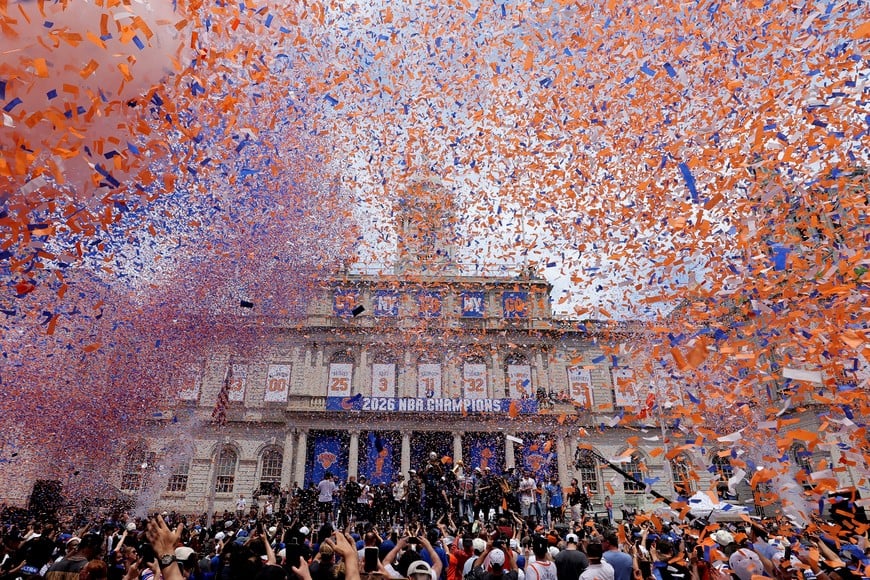 Jun 18, 2026; New York, NY, USA; New York Knicks players and coaches and staff celebrate their NBA championship with New York dignitaries and fans following a ceremony at New York City Hall. Mandatory Credit: Brad Penner-Imagn Images