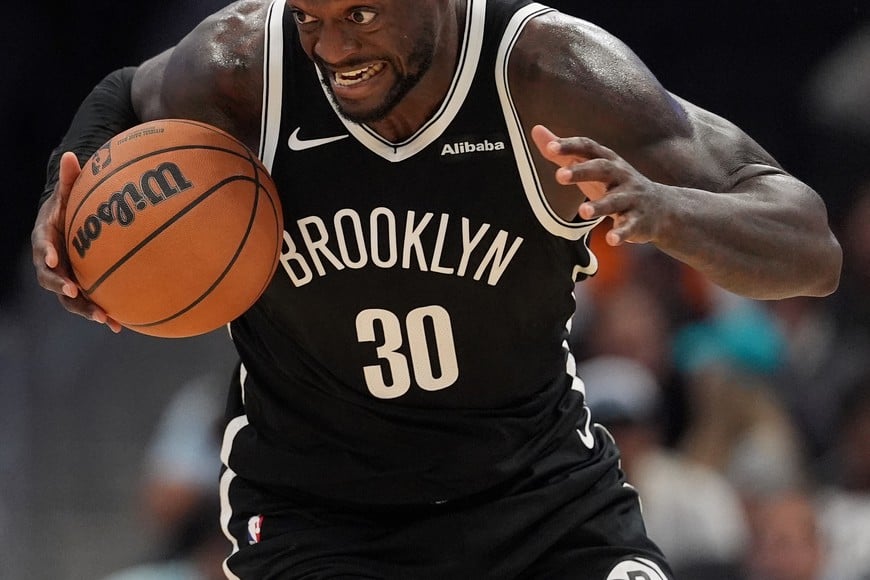 Oct 6, 2026; Charlotte, North Carolina, USA;  Brooklyn Nets forward Julius Randle (30) grabs a steal and brings the ball up court against the Charlotte Hornets during the second quarter at Spectrum Center.  Mandatory Credit: Jim Dedmon-Imagn Images