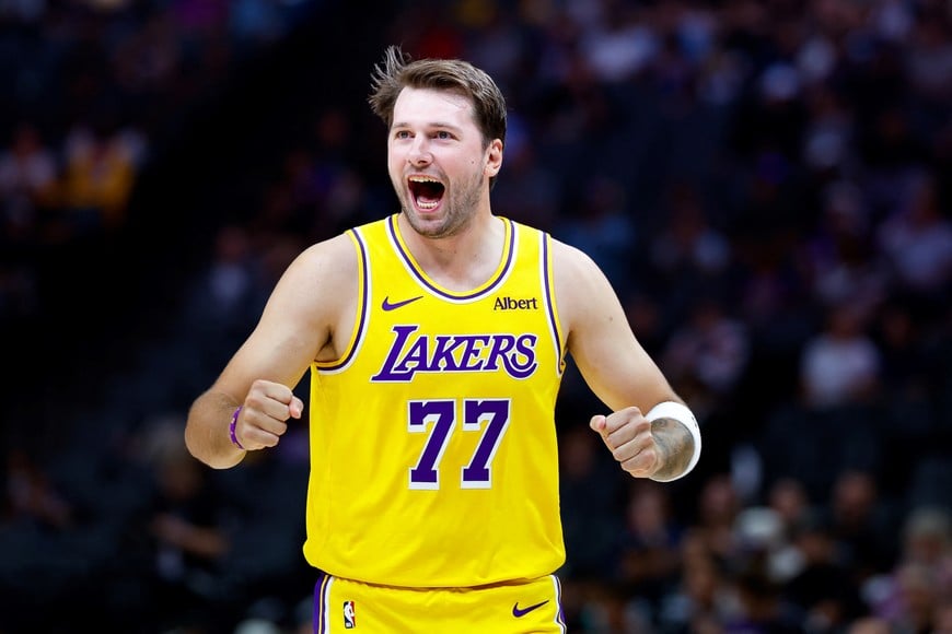 Oct 5, 2026; Sacramento, California, USA;  Los Angeles Lakers guard Luka Doncic (77) reacts after a play dfirst quarter against the Sacramento Kings at Golden 1 Center.  Mandatory Credit: Sergio Estrada-Imagn Images
