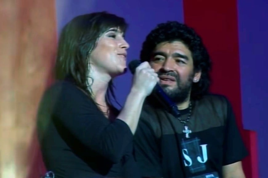 En 2006, arriba del escenario junto a Diego.