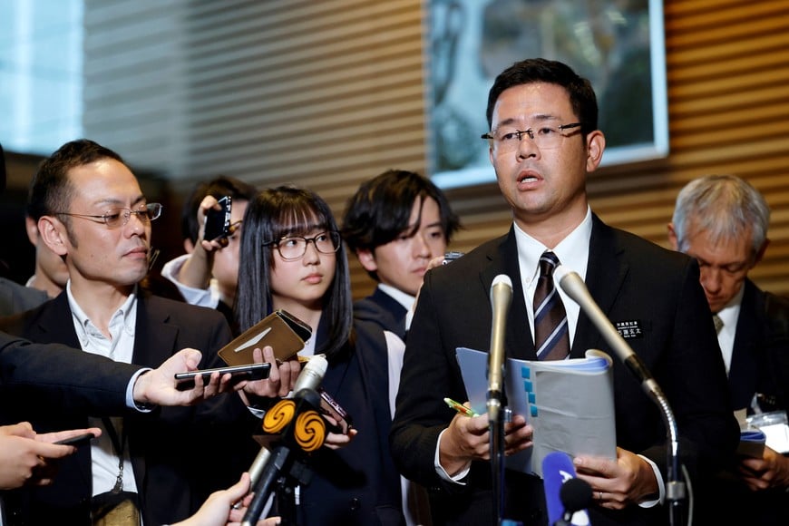 Okinawa Governor Genta Koja speaks to reporters after his meeting with Japanese Prime Minister Sanae Takaichi at the prime minister’s office in Tokyo, Japan, 07 October 2026. Okinawa Governor Koja met Prime Minister Takaichi following the alleged murder of a local woman by a US Marine stationed at the Marine Corps Air Station Futenma, Okinawa Prefecture, southern Japan.     FRANCK ROBICHON/Pool via REUTERS