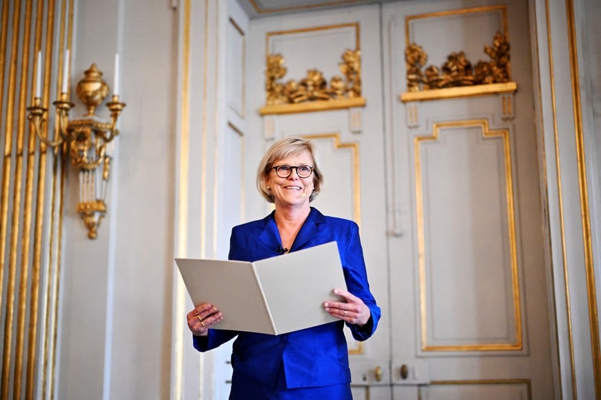 The Permanent Secretary of the Swedish Academy, Ingrid Carlberg, announces that Canadian author Anne Carson is awarded the Nobel Prize in Literature 2026, in Stockholm, Sweden, October 8, 2026. TT News Agency/Christine Olsson via REUTERS ATTENTION EDITORS - THIS IMAGE WAS PROVIDED BY A THIRD PARTY. SWEDEN OUT. NO COMMERCIAL OR EDITORIAL SALES IN SWEDEN.