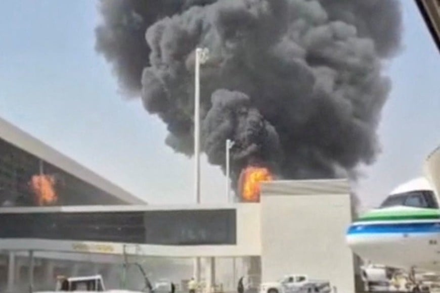 Smoke and flames rise from King Khalid Airport, after Yemen’s Iran-backed Houthis said they attacked the airport, in Riyadh, Saudi Arabia, October 8, 2026, in this screengrab obtained from a social media video. Social Media/via REUTERS THIS IMAGE HAS BEEN SUPPLIED BY A THIRD PARTY. NO RESALES. NO ARCHIVES. NEWS USE ONLY.
Verification lines:
The location was verified as Riyadh, Saudi Arabia, from the airport buildings, light poles, and painted tarmac markings which matched satellite imagery. Coordinates: 24.952651844496998, 46.70783371105999
Smoke was seen rising from a stationary aircraft at Riyadh airport on Thursday, according to a witness and three people briefed on the matter. There was no immediate official confirmation from Saudi authorities on the reported incident.
No versions of the video were found posted online before October 8.