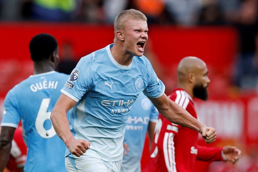 Soccer Football - Premier League - Manchester United v Manchester City - Old Trafford, Manchester, Britain - September 13, 2026
Manchester City's Erling Haaland celebrates after the match Action Images via Reuters/Jason Cairnduff EDITORIAL USE ONLY. NO USE WITH UNAUTHORIZED AUDIO, VIDEO, DATA, FIXTURE LISTS, CLUB/LEAGUE LOGOS OR 'LIVE' SERVICES. ONLINE IN-MATCH USE LIMITED TO 120 IMAGES, NO VIDEO EMULATION. NO USE IN BETTING, GAMES OR SINGLE CLUB/LEAGUE/PLAYER PUBLICATIONS. PLEASE CONTACT YOUR ACCOUNT REPRESENTATIVE FOR FURTHER DETAILS.. TPX IMAGES OF THE DAY