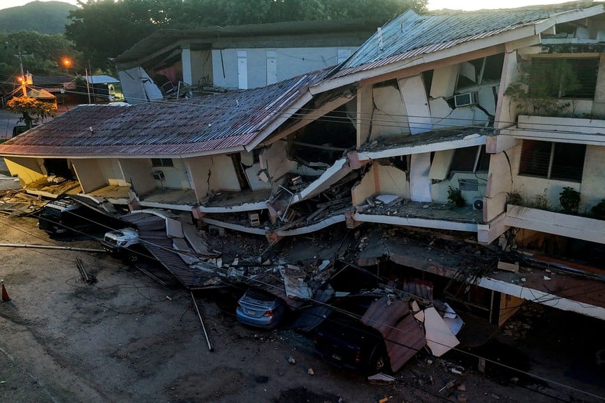 A drone view shows vehicles crushed beneath debris from a collapsed building after an earthquake struck near the southern coast of Panama, in Penonome, Panama, October 10, 2026. REUTERS/Enea Lebrun