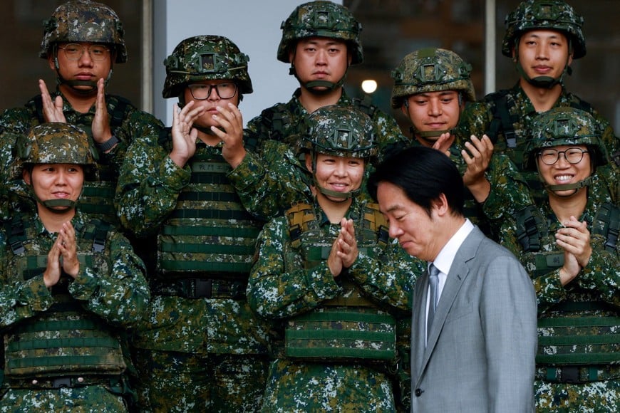 Soldiers applaud as Taiwan President Lai Ching-te arrives for a group photo at the Guandu Area Command in New Taipei City, Taiwan, June 16, 2026. REUTERS/Ann Wang TPX IMAGES OF THE DAY