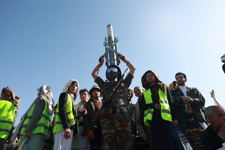 A Houthi supporter wearing a military uniform holds a mock missile as he joins Houthi supporters in a rally to show support to the movement as fighting intensifies across several Yemeni fronts, in Sanaa, Yemen October 9, 2026. REUTERS/Mohammed al-Mahdi
