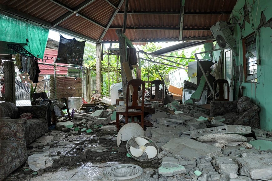Debris lies scattered across a damaged property following an earthquake that struck near Panama's southern coast in Macaracas, Panama, October 10, 2026. REUTERS/Enea Lebrun
