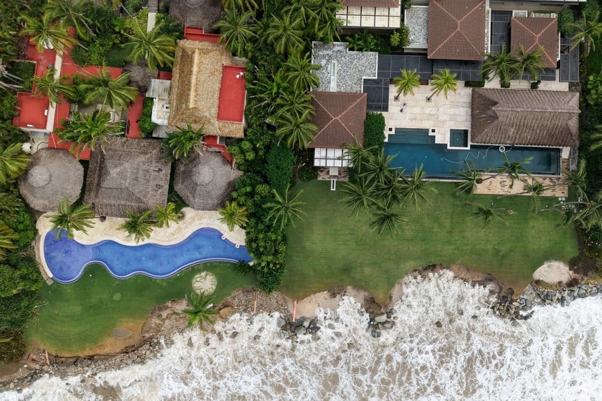 A drone view shows waves eroding the shoreline near beachfront properties as Hurricane Simon remains off Mexico's Pacific coast, in Bahia de Banderas, Nayarit state, Mexico, October 12, 2026. REUTERS/Christian Ruano TPX IMAGES OF THE DAY