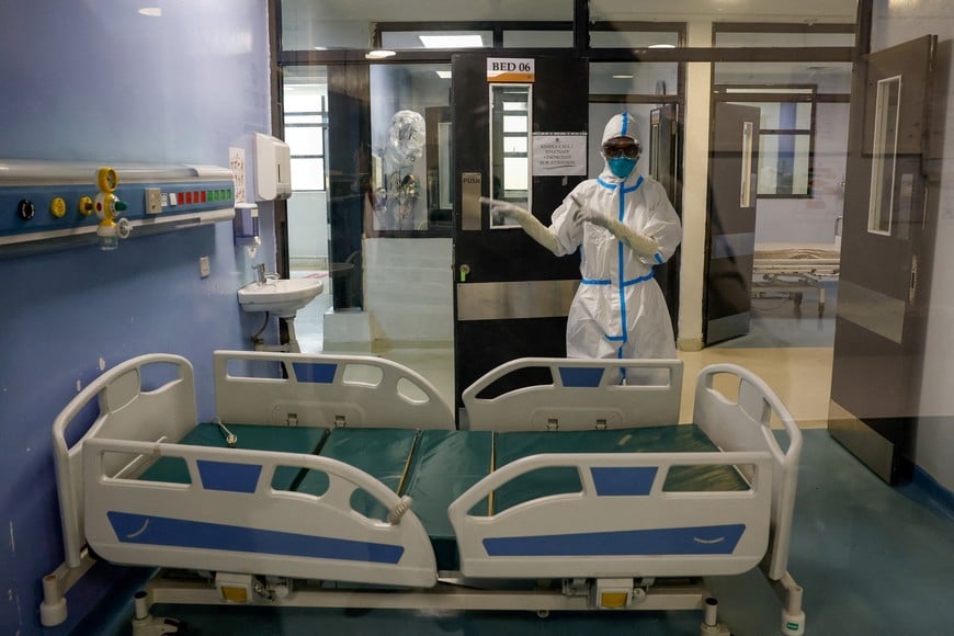 A nurse gestures inside Nairobi Hospital where an Ebola patient was isolated immediately upon arrival and treated at the hospital's physically separate East Wing Isolation Facility, but later died, in Nairobi, Kenya October 7, 2026. REUTERS/Monicah Mwangi TPX IMAGES OF THE DAY