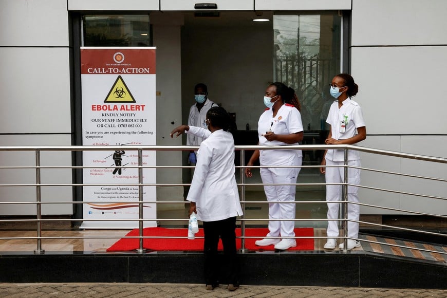 Staff members work at Nairobi Hospital where an Ebola patient was isolated immediately upon arrival and treated at the hospital's physically separate East Wing Isolation Facility, but later died, in Nairobi, Kenya October 7, 2026. REUTERS/Monicah Mwangi TPX IMAGES OF THE DAY