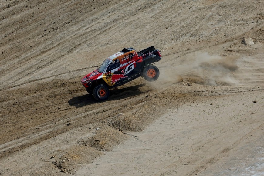 Rallying - Dakar Rally - Stage 13 - Yanbu to Yanbu - Yanbu, Saudi Arabia - January 17, 2026
Toyota Gazoo Racing W2RC's Toby Price and Armand Monleon in action during stage 13 Pool via REUTERS/Florent Gooden
