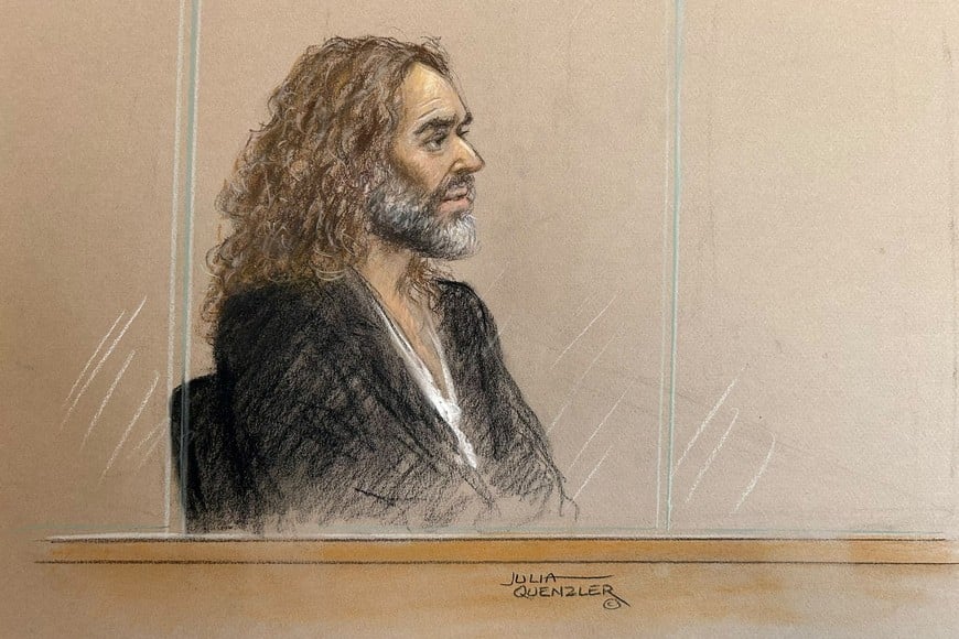 British actor and comedian Russell Brand appears at Southwark Crown Court where he stands trial on charges of rape and sexual assault involving six women between 1999 and 2009, which he denies, in London, Britain, October 14, 2026, in this courtroom sketch. REUTERS/Julia Quenzler