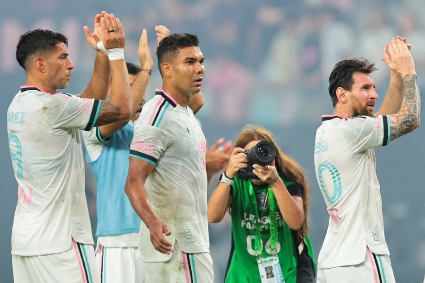 Oct 14, 2026; Miami, Florida, USA; Inter Miami CF forward Leo Messi (10), midfielder Carlos Casimiro (5), and forward Luis Suarez (9) acknowledges the fans after the game at Nu Stadium. Mandatory Credit: Sam Navarro-Imagn Images