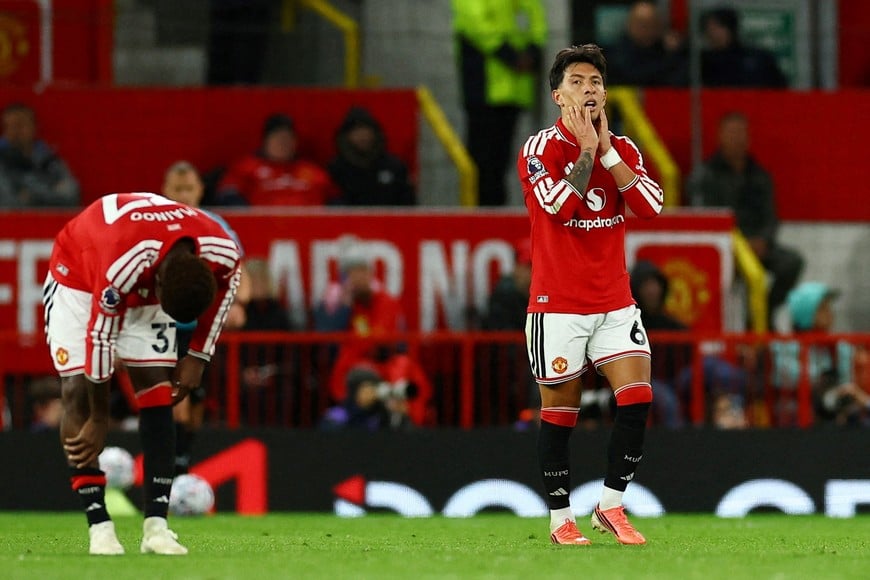 Soccer Football - Premier League - Manchester United v Tottenham Hotspur - Old Trafford, Manchester, Britain - October 10, 2026
Manchester United's Lisandro Martinez looks dejected after scoring Tottenham Hotspur first with an own goal REUTERS/Phil Noble EDITORIAL USE ONLY. NO USE WITH UNAUTHORIZED AUDIO, VIDEO, DATA, FIXTURE LISTS, CLUB/LEAGUE LOGOS OR 'LIVE' SERVICES. ONLINE IN-MATCH USE LIMITED TO 120 IMAGES, NO VIDEO EMULATION. NO USE IN BETTING, GAMES OR SINGLE CLUB/LEAGUE/PLAYER PUBLICATIONS. PLEASE CONTACT YOUR ACCOUNT REPRESENTATIVE FOR FURTHER DETAILS.. TPX IMAGES OF THE DAY