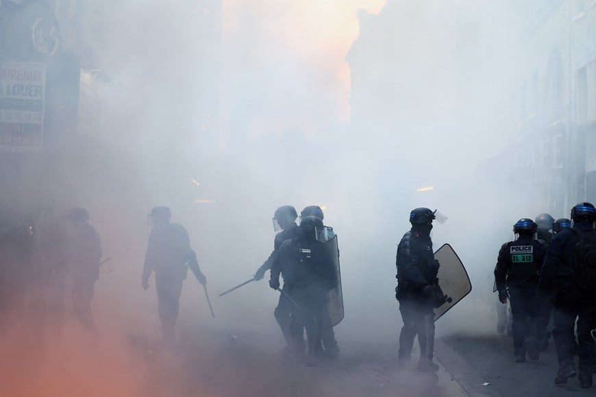 Riot police operate during civil unrest, the day after a national day of demonstrations against the cost of living and rising fuel prices, in Paris, France, October 18, 2026. REUTERS/Abdul Saboor