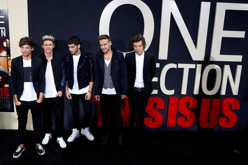 FILE PHOTO: (From L to R) Louis Tomlinson, Niall Horan, Zayn Malik, Liam Payne and Harry Styles of British boy band One Direction arrive for the premiere of their documentary film "This is Us" in New York, U.S., August 26, 2013. REUTERS/Lucas Jackson/File Photo