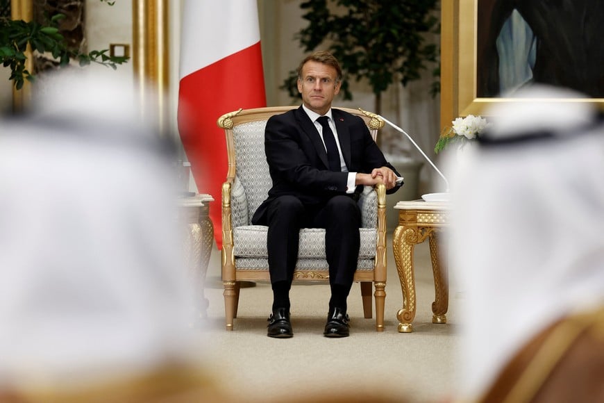 French President Emmanuel Macron attends a meeting with Sheikh Mohamed bin Zayed Al Nahyan, President of the United Arab Emirates (UAE), (not seen) at Qasr Al Watan presidential palace in Abu Dhabi, United Arab Emirates, October 19, 2026. REUTERS/Benoit Tessier/Pool