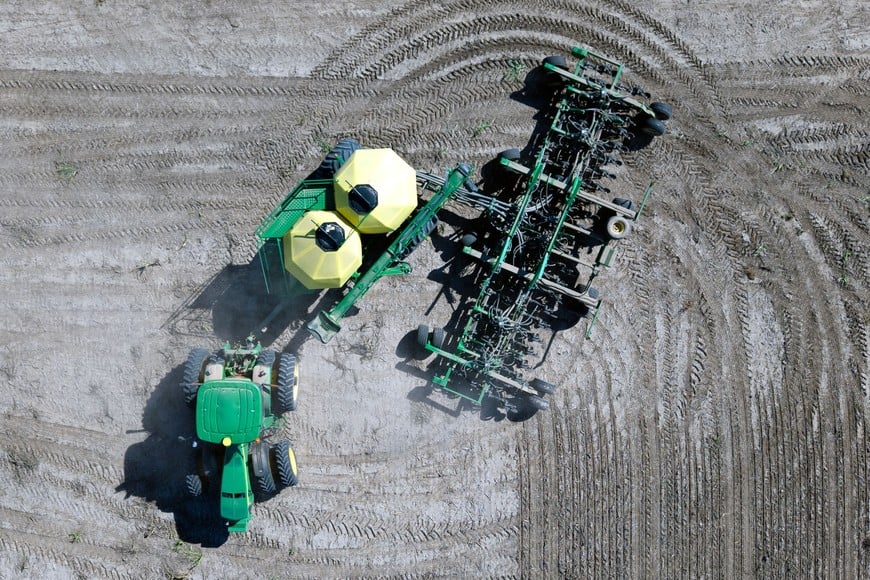 An aerial view of Kansas wheat dealer Ron Suppes operating an air seeder heavy equipment vehicle used to plant wheat seeds at his farm near Scott City, Kansas, US, October 8, 2026. REUTERS/Matt Mills McKnight