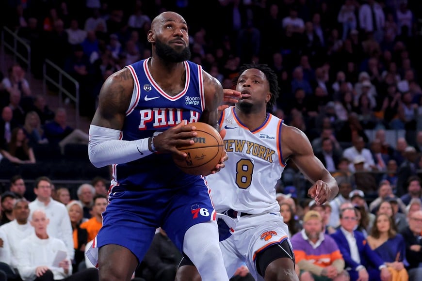 Oct 20, 2026; New York, New York, USA; Philadelphia 76ers forward LeBron James (23) looks to shoot the ball against New York Knicks forward OG Anunoby (8) during the fourth quarter at Madison Square Garden. Mandatory Credit: Brad Penner-Imagn Images