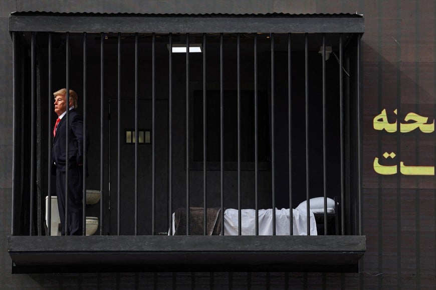 A person dressed up as US President Donald Trump stands inside a mock prison cell during a performance in Tehran, Iran, October 21, 2026. Majid Asgaripour/WANA (West Asia News Agency) via REUTERS ATTENTION EDITORS - THIS PICTURE WAS PROVIDED BY A THIRD PARTY. ISRAEL OUT. NO COMMERCIAL OR EDITORIAL SALES IN ISRAEL. NO ACCESS FOR ISRAELI MEDIA. NO USE BBC PERSIAN. NO USE VOA PERSIAN. NO USE MANOTO. NO USE IRAN INTERNATIONAL. NO USE RADIO FARDA. DIGITAL: NO USE BBC PERSIAN. NO USE VOA PERSIAN. NO USE MANOTO. NO USE IRAN INTERNATIONAL. NO USE RADIO FARDA.