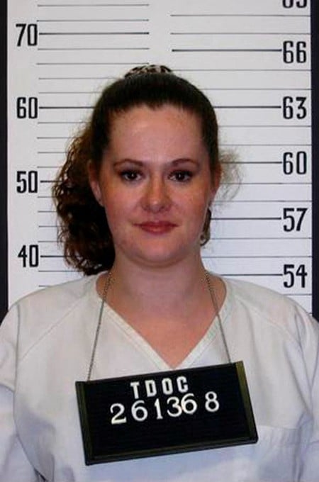 FILE PHOTO: Christa Gail Pike, 36, the only woman on Tennessee's Death Row, is pictured in this 2004 Tennessee Department of Correction booking photograph obtained by Reuters March 22, 2012. A prison guard and the boyfriend of Pike, have been charged in connection with a plan to break her out of the Tennessee Prison for Women in Nashville. A grand jury indicted 23-year-old Justin Heflin, previously a correctional officer at the Tennessee Prison for Women, on one count of bribery, one count of official misconduct, one count of conspiracy to commit escape and one count of facilitation to commit escape. Donald Kohut, 34, an acquaintance of Pike who frequently visited her in prison, was indicted on one count of bribery and one count of conspiracy to commit escape. REUTERS/Tennessee Department of Correction/Handout (UNITED STATES - Tags: CRIME LAW SOCIETY) FOR EDITORIAL USE ONLY. NOT FOR SALE FOR MARKETING OR ADVERTISING CAMPAIGNS. THIS IMAGE HAS BEEN SUPPLIED BY A THIRD PARTY. IT IS DISTRI