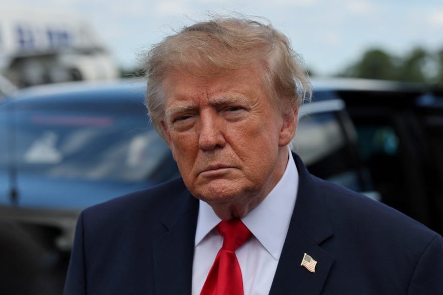 US President Donald Trump looks on after disembarking Air Force One as he arrives at Southwest Florida International Airport in Fort Myers, Florida, US, October 23, 2026. REUTERS/Umit Bektas