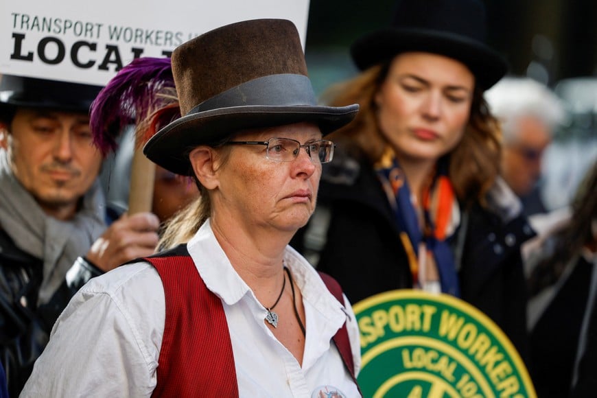 Demonstrators gather ahead of a vote on Romanch's Law, legislation that would phase out horse-drawn carriages in Central Park, outside City Hall in New York City, US, October 22, 2026. REUTERS/Eduardo Munoz