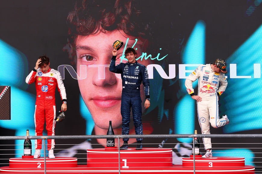 Formula One F1 - United States Grand Prix - Circuit of the Americas, Austin, Texas, U.S. - October 25, 2026
Mercedes' Andrea Kimi Antonelli celebrates on the podium after winning the United States Grand Prix alongside second placed Ferrari's Charles Leclerc and third placed Red Bull's Max Verstappen REUTERS/Mike Segar