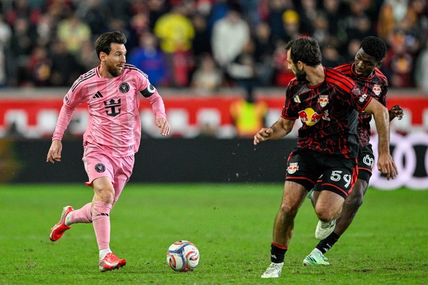Oct 24, 2026; Harrison, New Jersey, USA; Inter Miami CF forward Leo Messi (10) dribbles against Red Bull New York defender Devin Padelford (59) during the second half at Sports Illustrated Stadium. Mandatory Credit: Mark Smith-Imagn Images